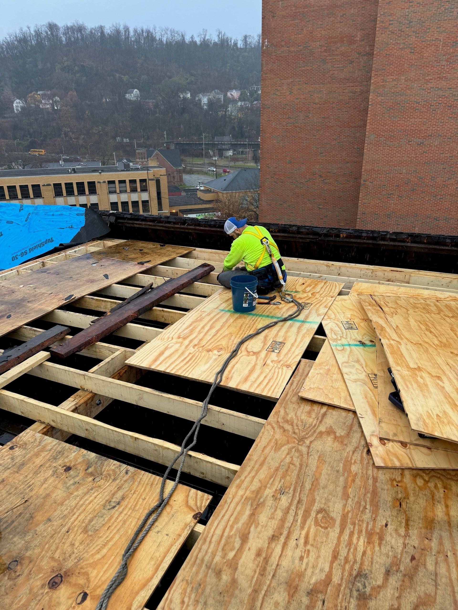 Architectural plans and construction materials at a jobsite