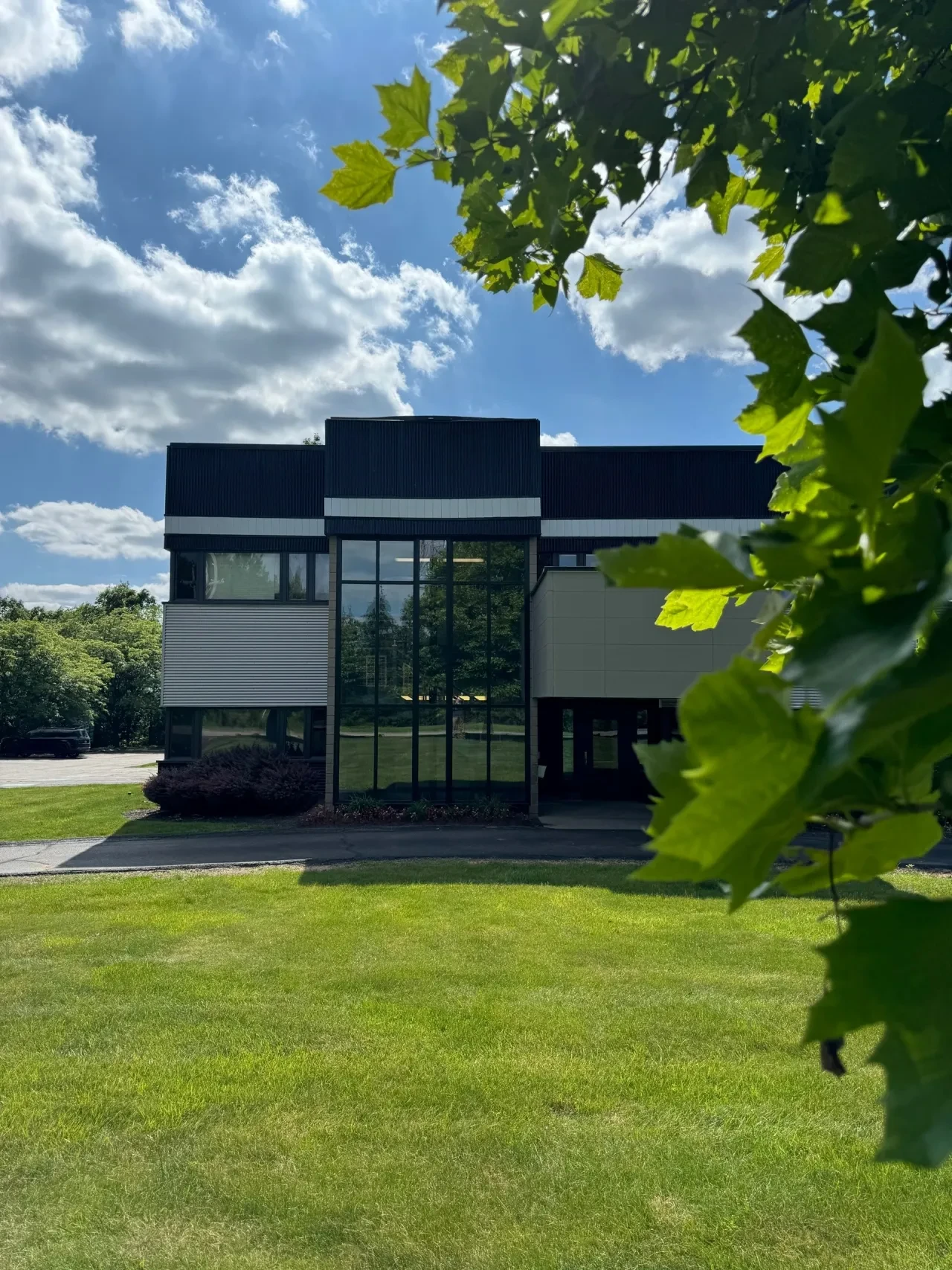 Finished commercial building exterior showing new metal siding and renovated facade